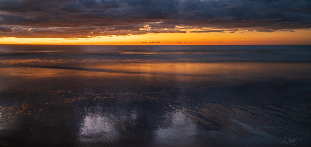 Sunrise over the Atlantic at Trancoso — photograph by Lawrence Leyderman