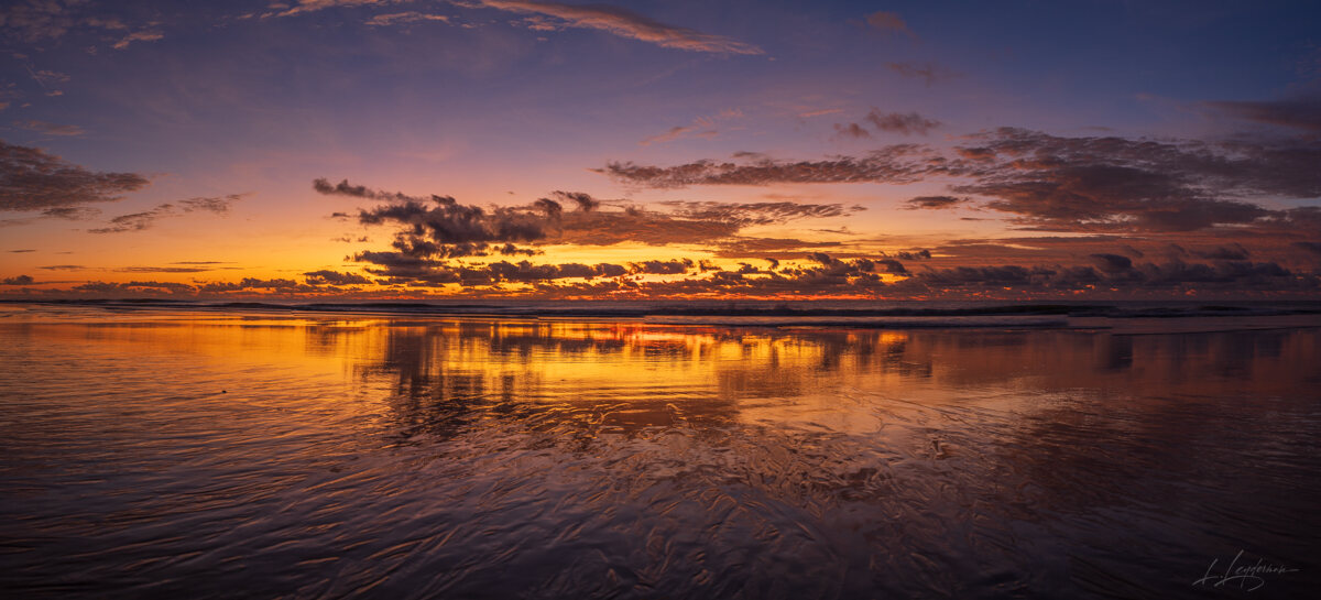 Sunrise over the Atlantic at Trancoso — photograph by Lawrence Leyderman