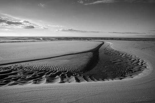 Tidal sand patterns at low tide, Trancoso — photograph by Lawrence Leyderman