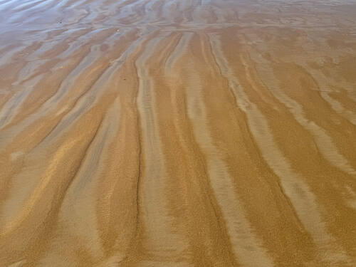 Tidal sand patterns at low tide, Trancoso — photograph by Lawrence Leyderman