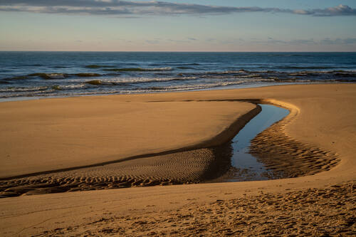 Tidal sand patterns at low tide, Trancoso — photograph by Lawrence Leyderman