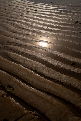 Tidal sand patterns at low tide, Trancoso — photograph by Lawrence Leyderman