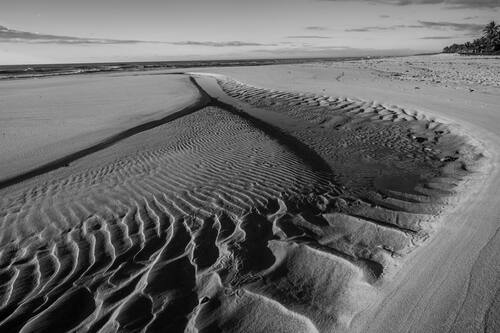 Tidal sand patterns at low tide, Trancoso — photograph by Lawrence Leyderman