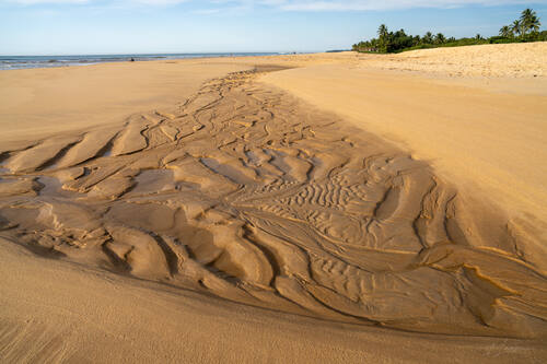 Tidal sand patterns at low tide, Trancoso — photograph by Lawrence Leyderman