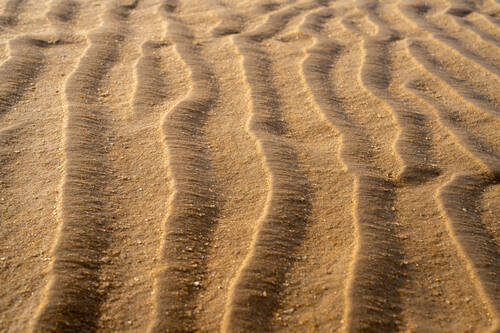 Tidal sand patterns at low tide, Trancoso — photograph by Lawrence Leyderman