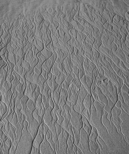 Tidal sand patterns at low tide, Trancoso — photograph by Lawrence Leyderman