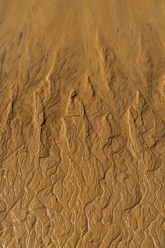 Tidal sand patterns at low tide, Trancoso — photograph by Lawrence Leyderman