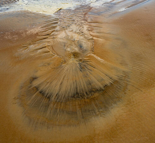 Tidal sand patterns at low tide, Trancoso — photograph by Lawrence Leyderman
