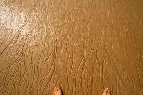 Tidal sand patterns at low tide, Trancoso — photograph by Lawrence Leyderman