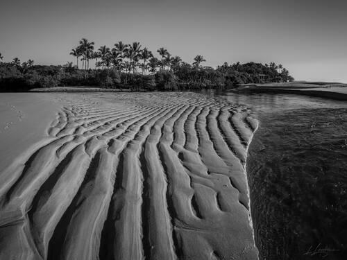 Tidal sand patterns at low tide, Trancoso — photograph by Lawrence Leyderman
