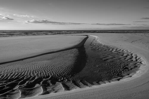 Tidal sand patterns at low tide, Trancoso — photograph by Lawrence Leyderman
