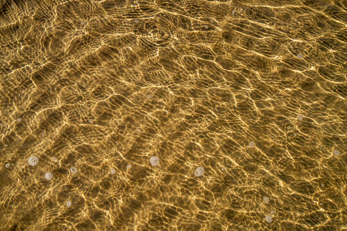 Tidal sand patterns at low tide, Trancoso — photograph by Lawrence Leyderman