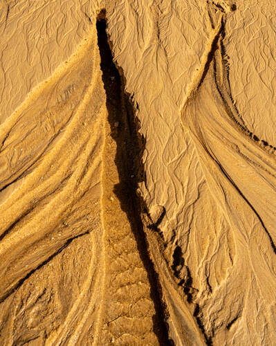 Tidal sand patterns at low tide, Trancoso — photograph by Lawrence Leyderman