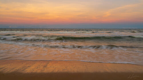 Sunrise over the Atlantic at Trancoso — photograph by Lawrence Leyderman