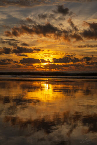 Sunrise over the Atlantic at Trancoso — photograph by Lawrence Leyderman
