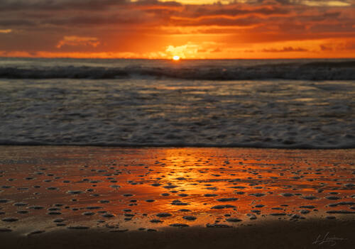 Sunrise over the Atlantic at Trancoso — photograph by Lawrence Leyderman