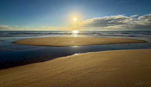 Sunrise over the Atlantic at Trancoso — photograph by Lawrence Leyderman