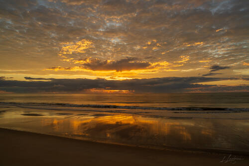 Sunrise over the Atlantic at Trancoso — photograph by Lawrence Leyderman
