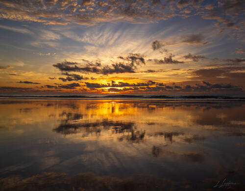 Sunrise over the Atlantic at Trancoso — photograph by Lawrence Leyderman