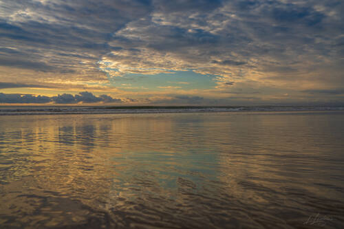 Sunrise over the Atlantic at Trancoso — photograph by Lawrence Leyderman