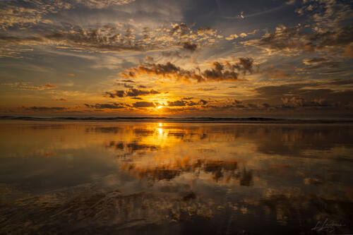 Sunrise over the Atlantic at Trancoso — photograph by Lawrence Leyderman