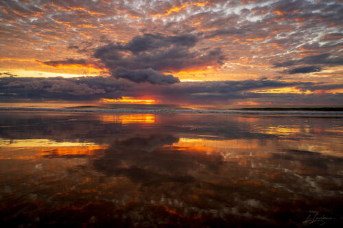 Sunrise over the Atlantic at Trancoso — photograph by Lawrence Leyderman