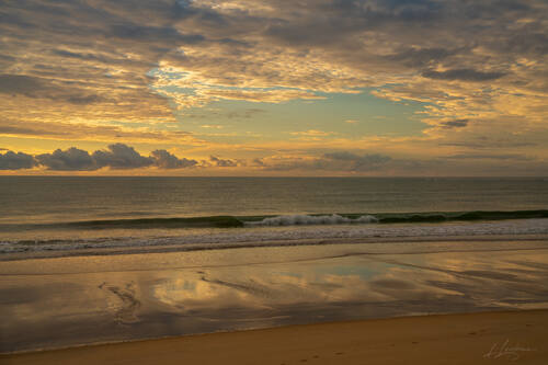 Sunrise over the Atlantic at Trancoso — photograph by Lawrence Leyderman