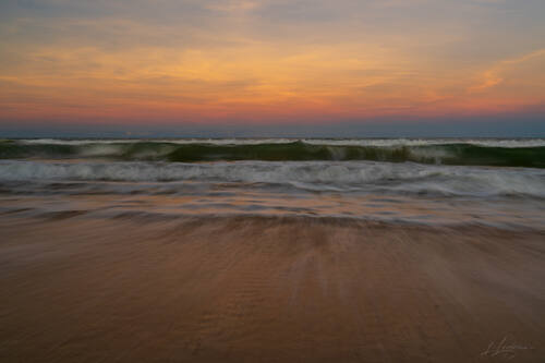 Sunrise over the Atlantic at Trancoso — photograph by Lawrence Leyderman