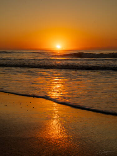 Sunrise over the Atlantic at Trancoso — photograph by Lawrence Leyderman