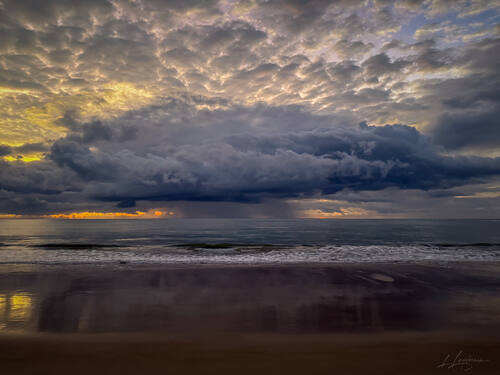 Sunrise over the Atlantic at Trancoso — photograph by Lawrence Leyderman