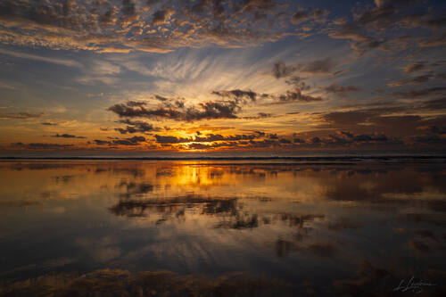 Sunrise over the Atlantic at Trancoso — photograph by Lawrence Leyderman