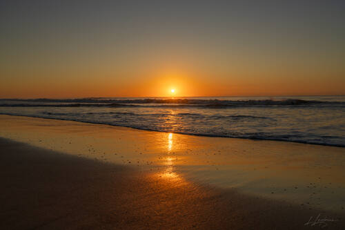Sunrise over the Atlantic at Trancoso — photograph by Lawrence Leyderman